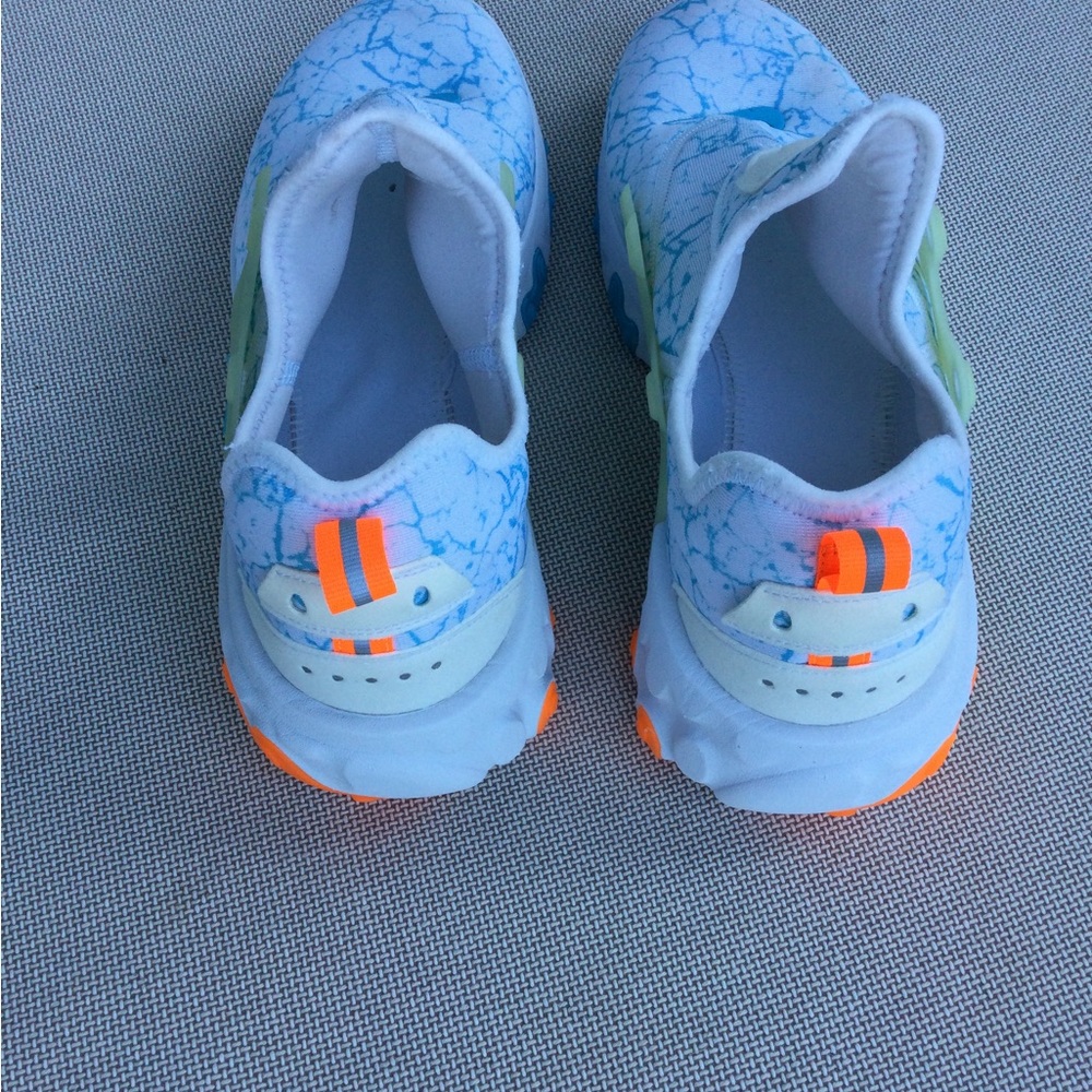 Nike Youth Light Blue Marble Slip-Ons with Neon Orange Accents